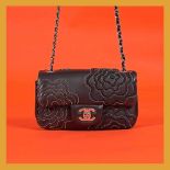 "Camellia Follie" - Chanel bag, extra mini, leather, for women, accompanied by authenticity card and