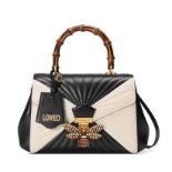 "Queen Margaret" - Gucci bag, leather, monochrome, centrally decorated with a stylized bee and bambo