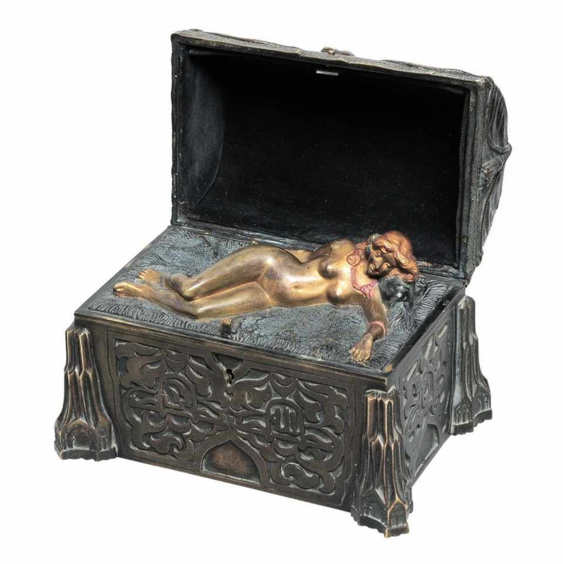Bronze sculpture with a trick &quot;Chest with naked woman inside&quot;. Vienna.