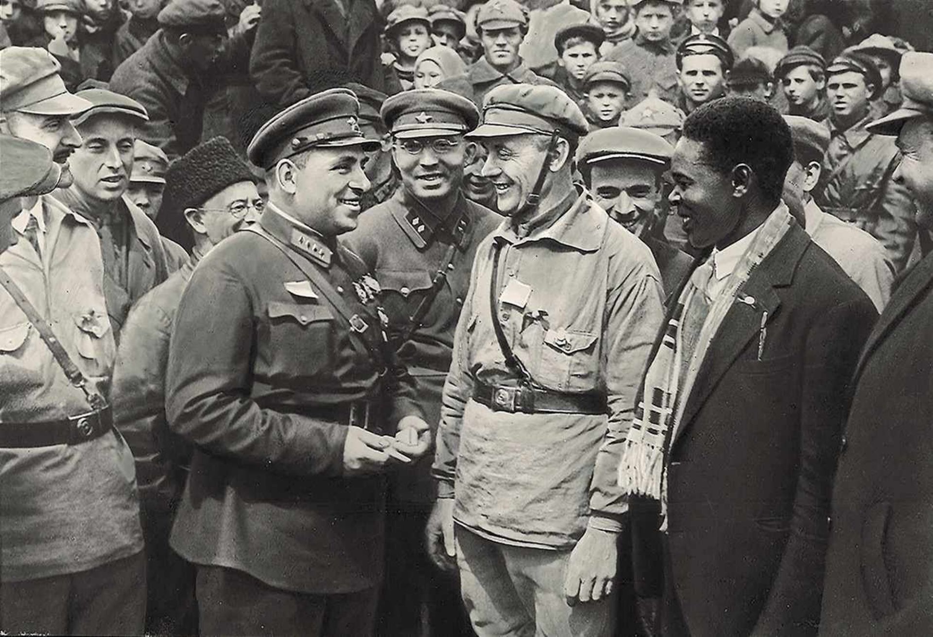 [Soviet]. Photograph "Marshal of the Soviet Union Vasily Blukher is chatting with german delegates