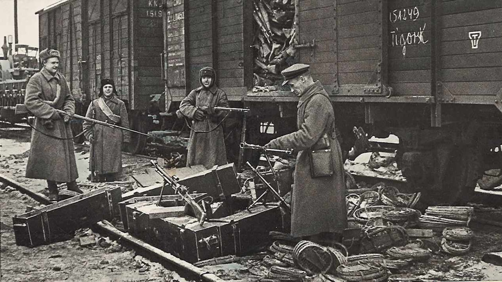 [Soviet]. Photograph "Echelons with captured German weapons". 1940s. Original print. - 9x16 cm.
