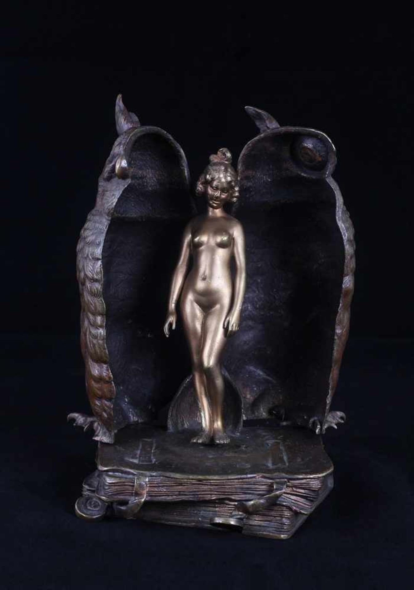 Owl on the books with naked woman inside. Vienna bronze sculpture with a trick. Bergmann, Franz.