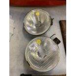 A PAIR OF VINTAGE HEADLIGHTS