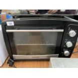 A SILVERCREST MINI OVEN AND GRILL IN WORKING ORDER