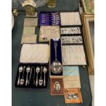 A COLLECTION OF BOXED FLATWARE AND VINTAGE PHOTO BOOKLETS