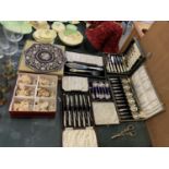 A GROUP OF BOXED FLATWARE TOGETHER WITH A SET OF SIX GLASSES AND PLACE MATS