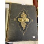 A VINTAGE LEATHER BOUND HOLY BIBLE WITH ILLUSTRATIONS