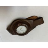 A VINTAGE LEATHER WRIST WATCH