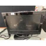 A KENMARK 19 INCH TELEVISION IN WORKING ORDER