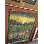 A LARGE GILT FRAMED ORIENTAL CLOTH PICTURE