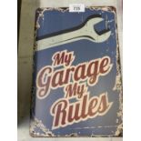 A VINTAGE STYLE METAL 'MY GARAGE, MY RULES' SIGN