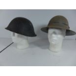 TWO WORLD WAR II PERIOD BRODIE HELMETS