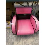 A RETRO STYLE PINK CHILDREN'S ARMCHAIR