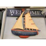 A WELCOME BOAT SIGN