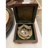 A BOXED BRASS SUNDIAL J.H STEWARD COMPASS