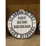 A CIRCULAR PEAKY BLINDERS CAST SIGN