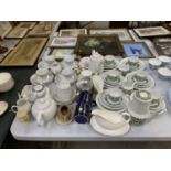 A MIXED GROUP OF CERAMICS TO INCLUDE CUPS, SAUCERS, SIDE PLATES, TEA POTS ETC