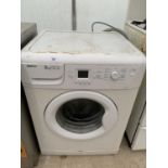 A BEKO WME7227W WASHING MACHINE IN WORKING ORDER IN NEED OF CLEAN