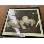 A FRAMED VICTORIAN PRINT OF A GIRL AND A DOG