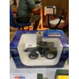 A UNIVERSAL HOBBIES 1:32 SCALE VALTRA T "BLACK DIAMOND" DIE CAST TRACTOR MODEL