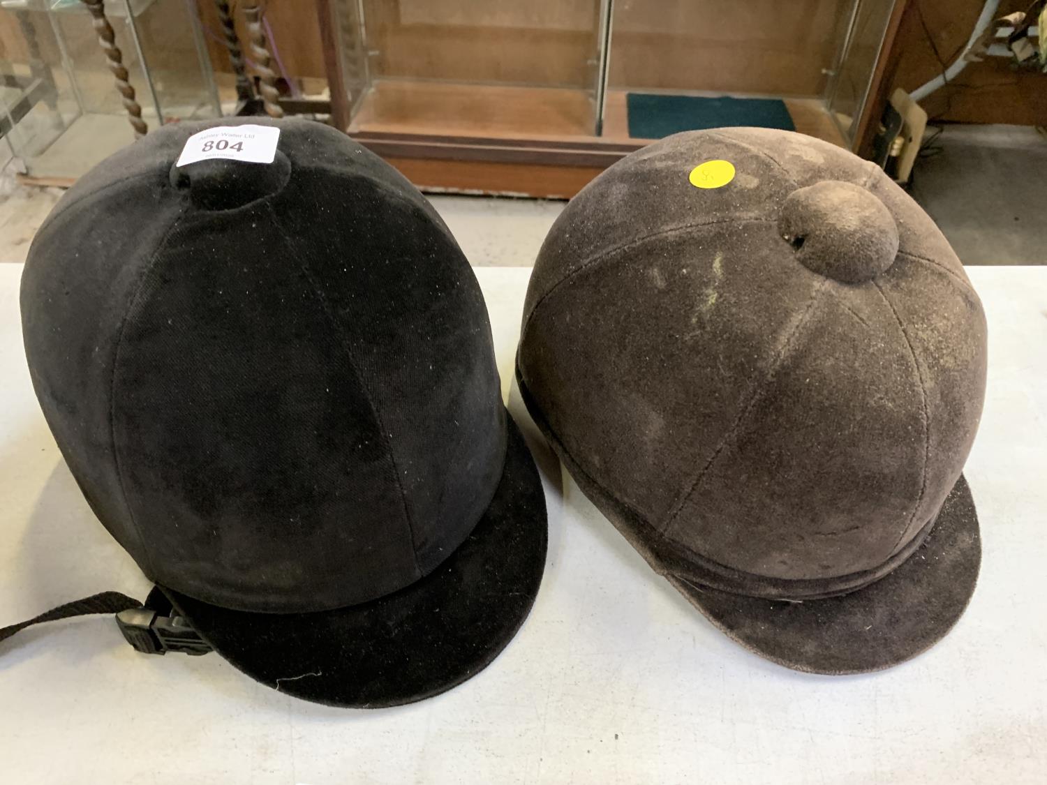 TWO HARD RIDING HATS