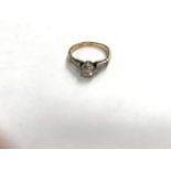 AN 18CT GOLD DIAMOND SOLITAIRE RING