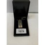 A BOXED SILVER INGOT NECKLACE