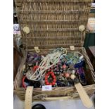 A BASKET CONTAINING ASSORTED COSTUME JEWELLERY