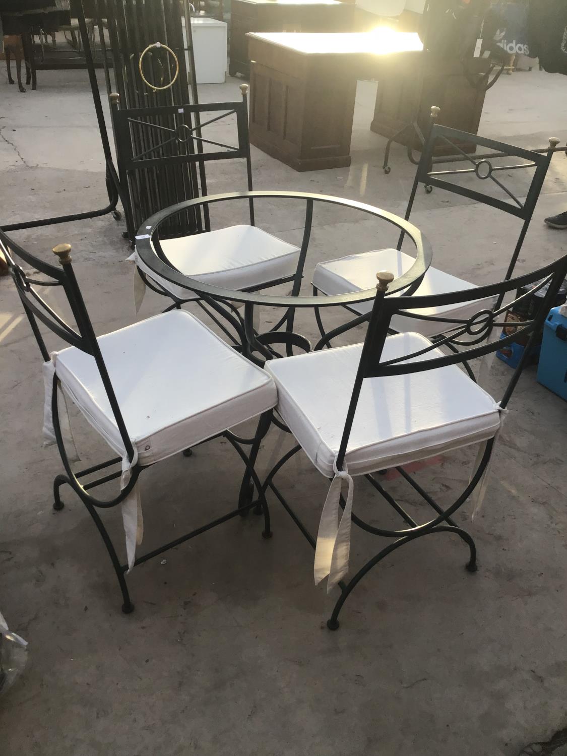 A VERDI GRIS STYLE CIRCULAR TABLE (NO TOP) AND FOUR MATCHING CHAIRS WITH CREAM SEAT PADS