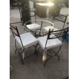 A VERDI GRIS STYLE CIRCULAR TABLE (NO TOP) AND FOUR MATCHING CHAIRS WITH CREAM SEAT PADS