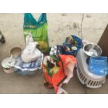 WET AND DRY PET FOOD, A CARRIER, CAT LITTER AND BOWLS