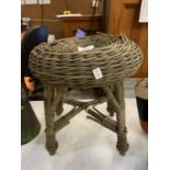 A VINTAGE WICKER SMALL STOOL