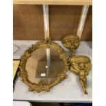 A GILT FRAMED ORNATE MIRROR AND PAIR OF CHERUB WALL SCONCES