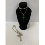 TWO SILVER NECKLACES WITH CROSS PENDANTS