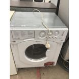 AN INTEGRATED HOTPOINT WASHER/DRYER IN WORKING ORDER