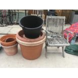 A WOODEN FOLDING CHAIR AND VARIOUS POTS