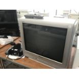 A PANASONIC TELEVISION WITH BOX AND REMOTE CONTROL IN WORKING ORDER