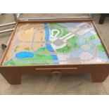 AN ELC PLAY TABLE WITH STORAGE DRAWER