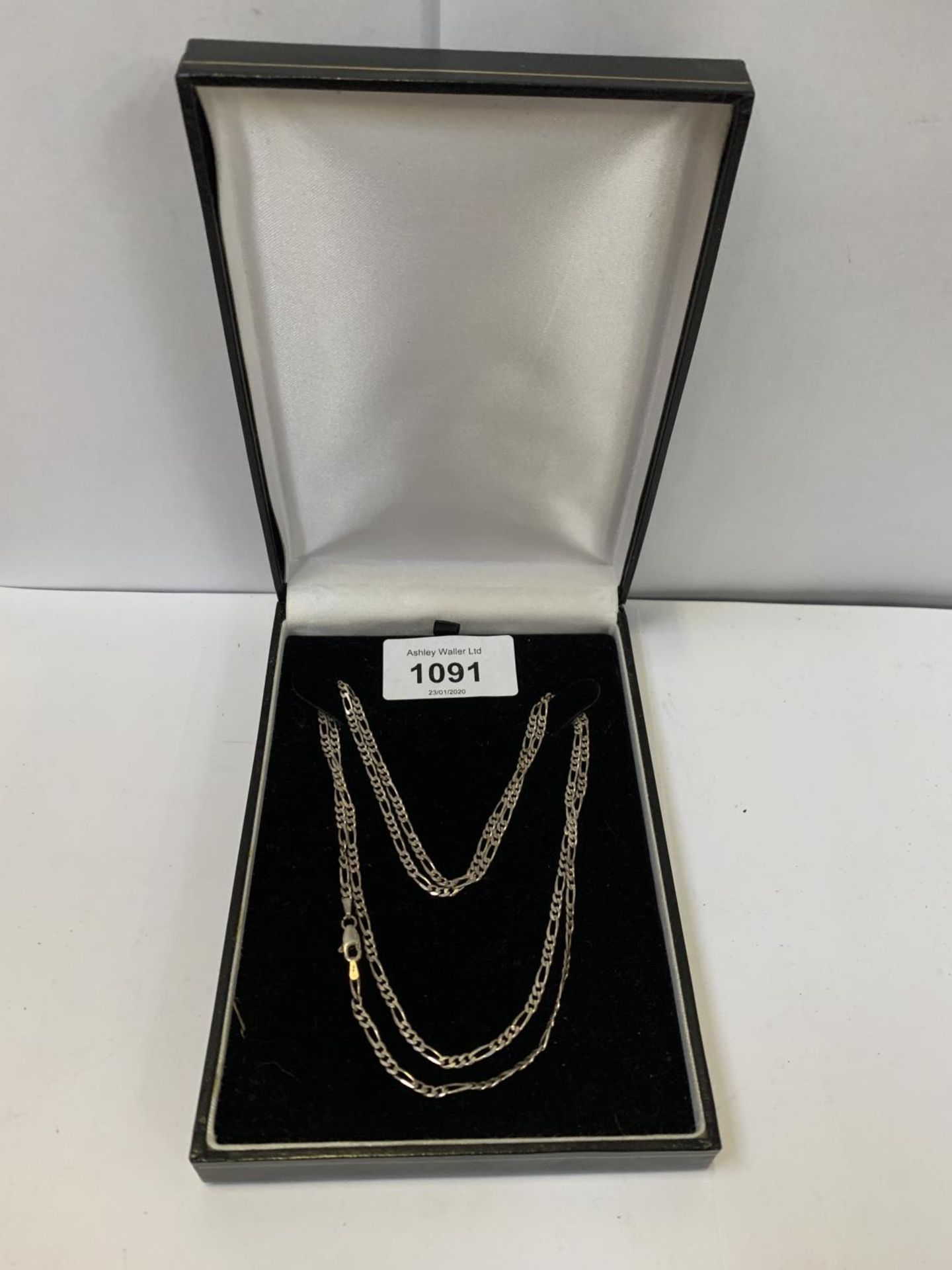 A BOXED SILVER NECKLACE