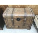 A WOODEN TRAVEL TRUNK (LOWER DRAW HANDLE MISSING)