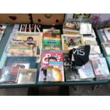 A LARGE COLLECTION OF ELVIS PRESLEY BOOKLETS AND BROCHURES ETC