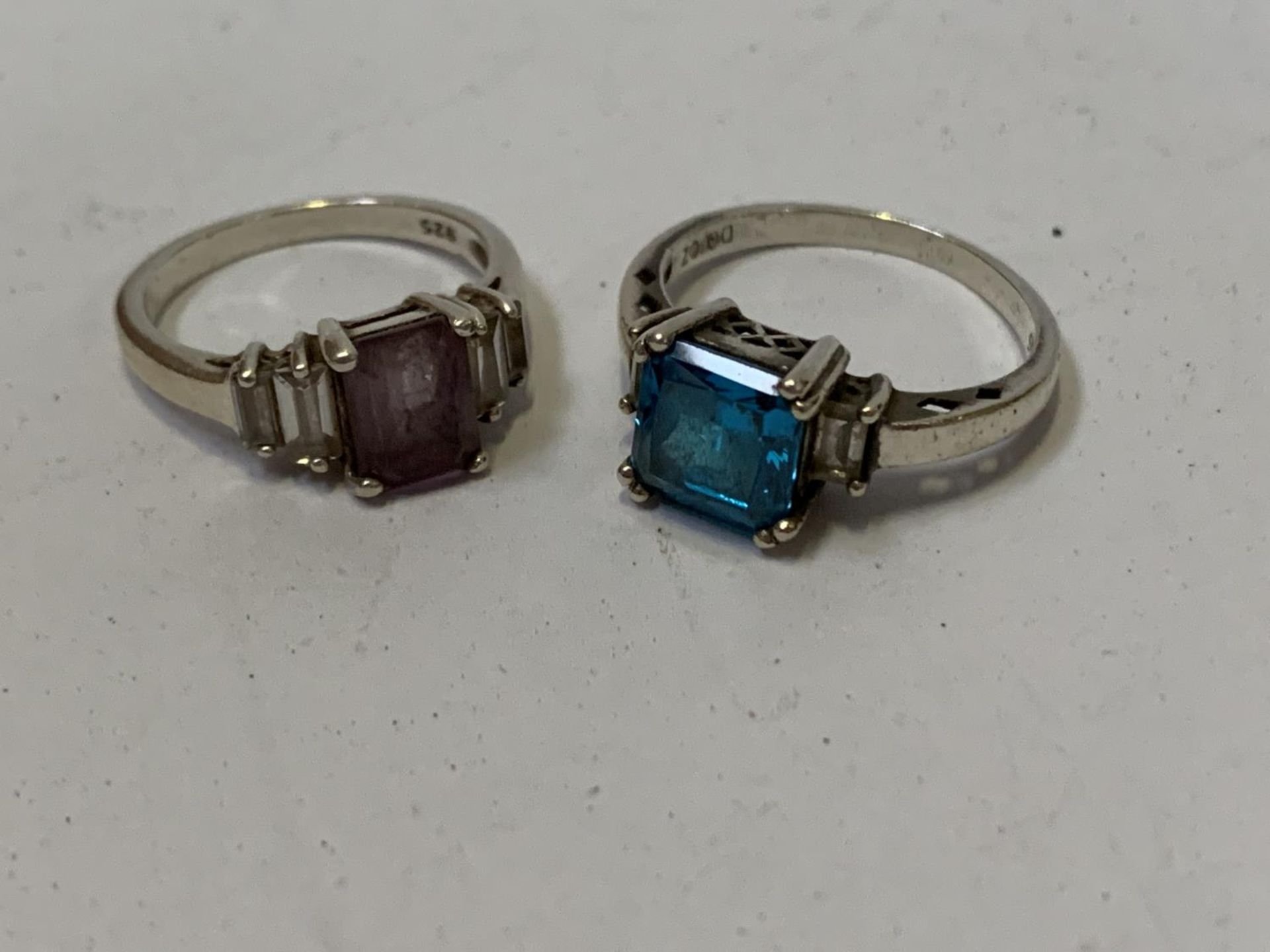 TWO SILVER DRESS RINGS WITH STONE DESIGN