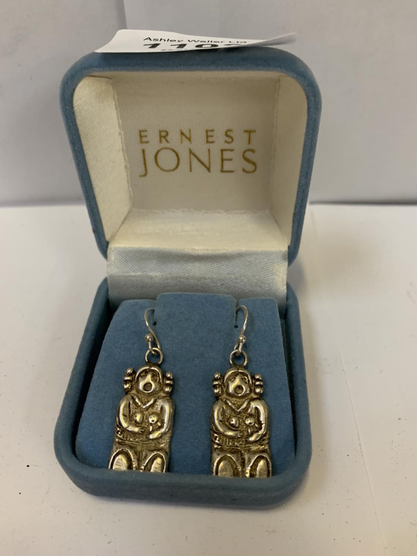 A PAIR OF BOXED SILVER EARRINGS