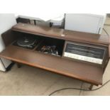 A RETRO TEAK STEREO UNIT TO INCLUDE A GARRAD 6200C RECORD DECK AND FERGUSON RADIO