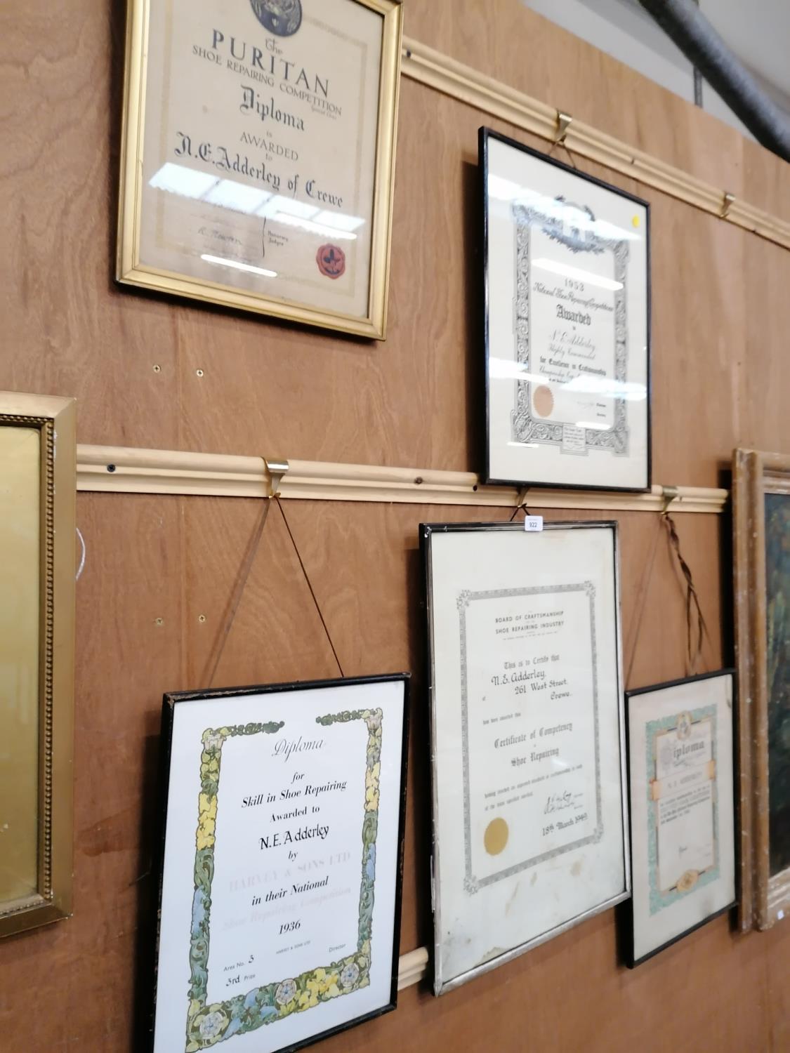 A GROUP OF FIVE FRAMED SHOE REPAIRING CERTIFICATES