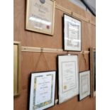 A GROUP OF FIVE FRAMED SHOE REPAIRING CERTIFICATES