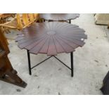 AN UNUSUAL FAN STYLE BISTRO TABLE