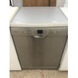 A BOSCH SILVER EDITION DISHWASHER IN WORKING ORDER NEEDS A CLEAN