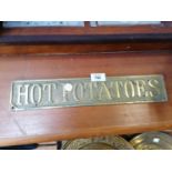 A VINTAGE BRASS 'HOT POTATOES' SIGN