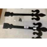 A PAIR OF BLACK CAST GATE HINGES